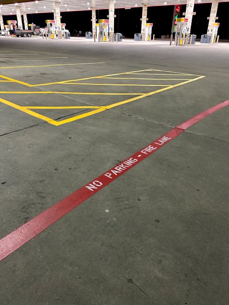 Why do faded parking lot lines create problems for businesses and customers